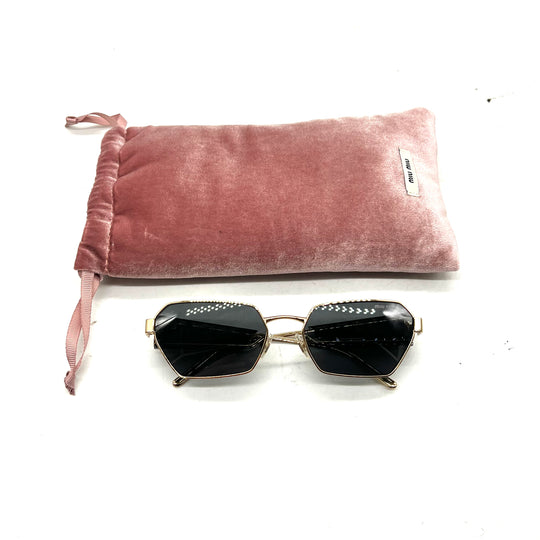 Lentes Miu Miu