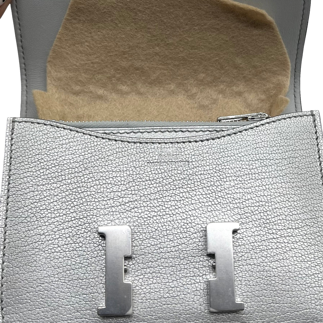 Cinturón Hermès Kelly 18 y Cartera Constance Slim Argent