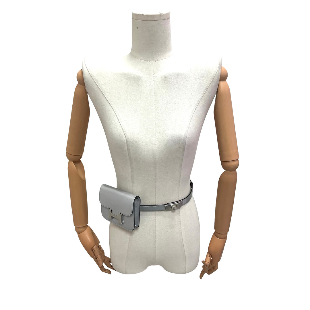 Cinturón Hermès Kelly 18 y Cartera Constance Slim Argent