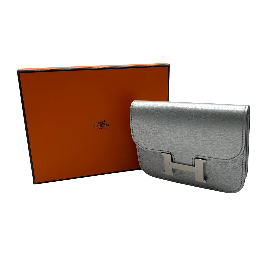 Cinturón Hermès Kelly 18 y Cartera Constance Slim Argent