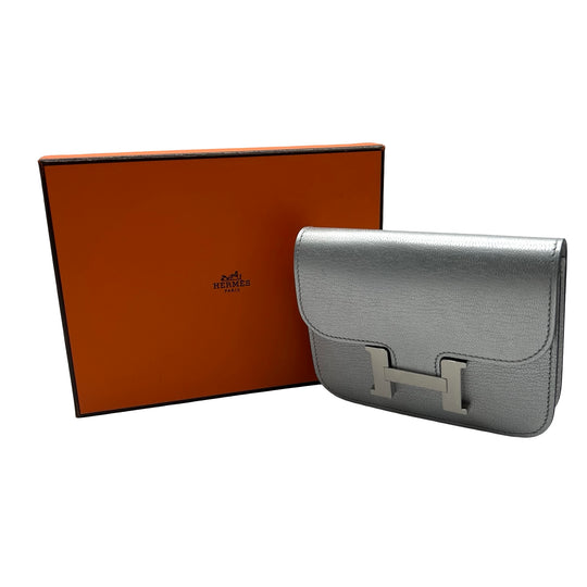 Cinturón Hermès Kelly 18 y Cartera Constance Slim Argent
