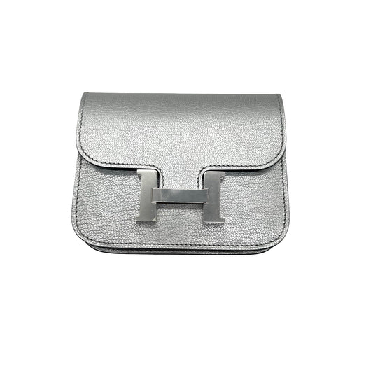 Cinturón Hermès Kelly 18 y Cartera Constance Slim Argent